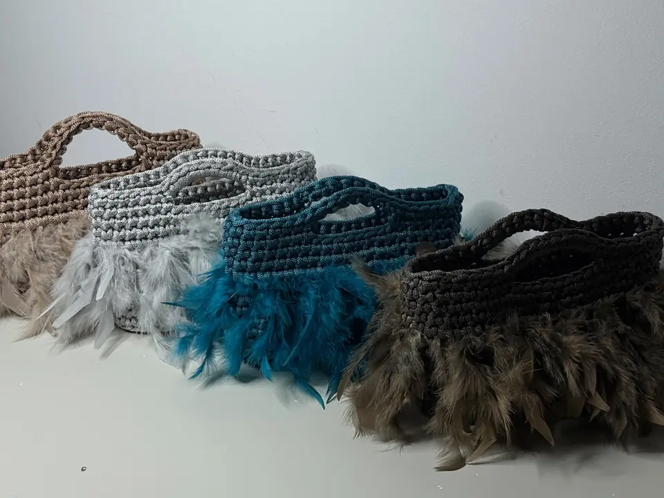 Borse crochet Le Mama con dettagli decorativi